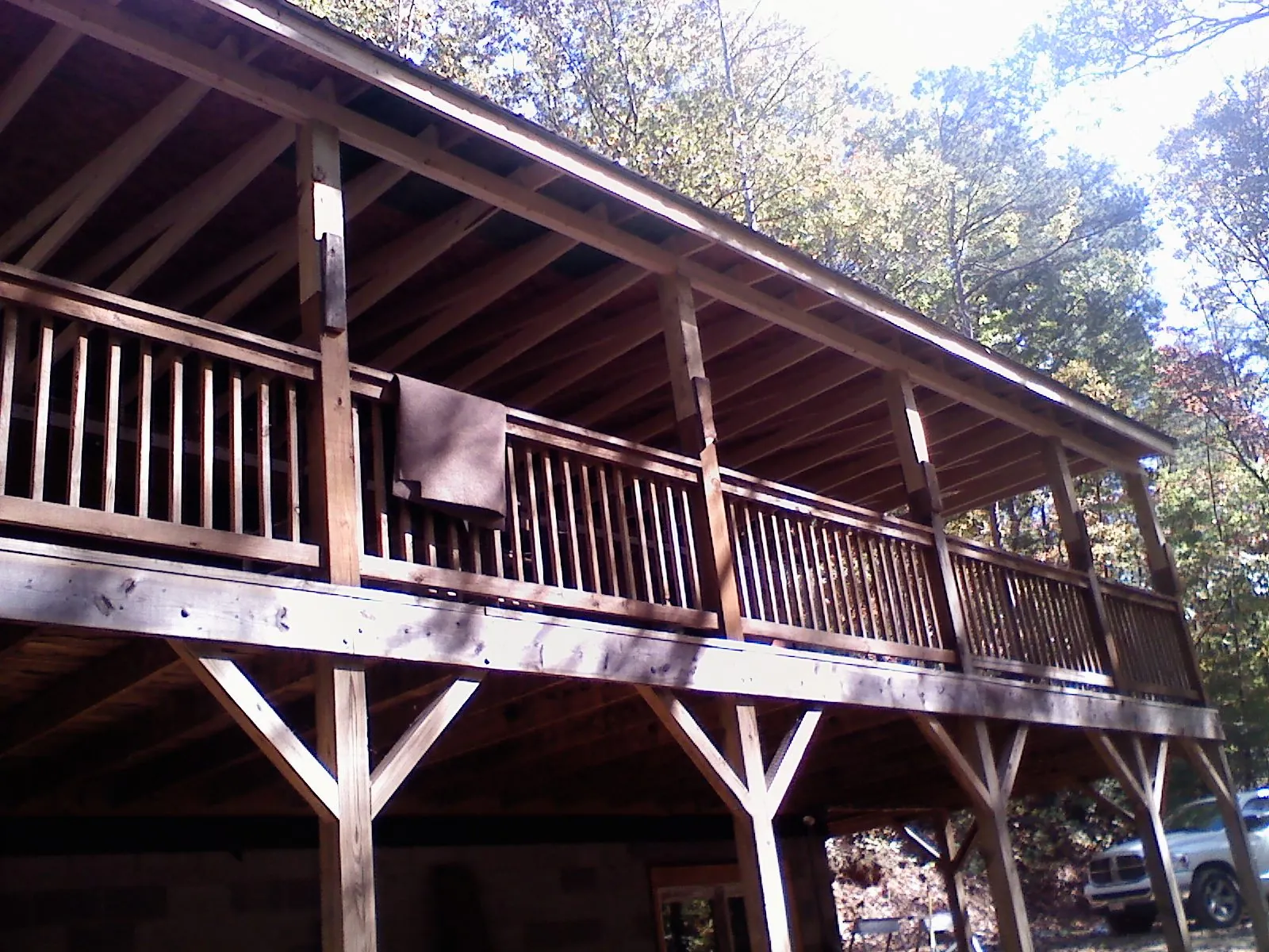 Timber framing under a new elevated porch and deck — Roof Leak Repair in Faison by Roofing Brothers